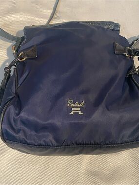 Salad Navy Crossbody Bag with Gold Logo, with green leather accent
